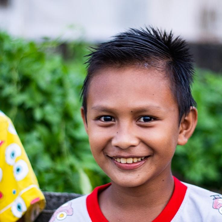 Maya Singh, Lead Design Curator at Everyday Balance Quide, reviewing corporate floral arrangements